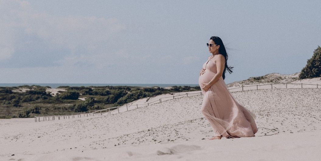 pregnant woman on the beach