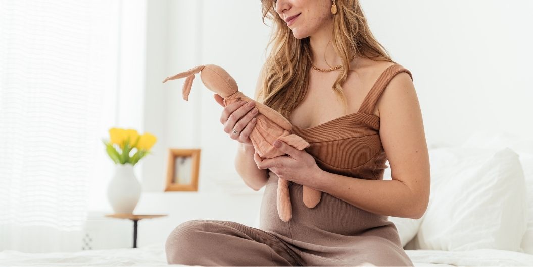 pregnant woman with toy