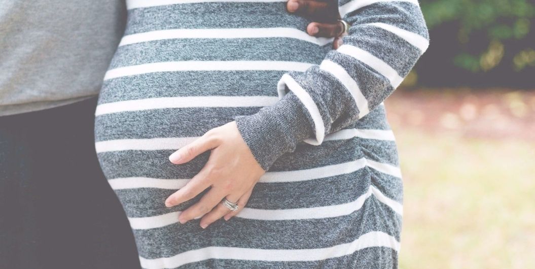 pregnant woman in striped dress